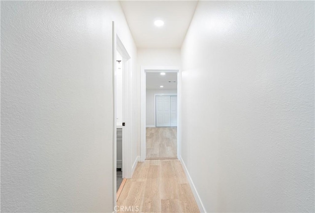 1818 W 79th St, Los Angeles, CA 90047 - hall featuring light wood finished floors and recessed lighting