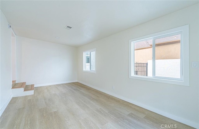 1818 W 79th St, Los Angeles, CA 90047 - spare room featuring light wood-style floors and baseboards
