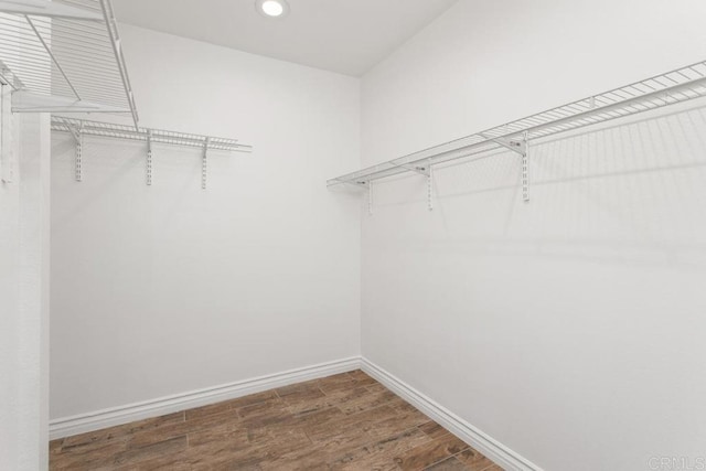1811 E Grand Ave Unit 162, Escondido, CA 92027 - walk in closet featuring wood finished floors