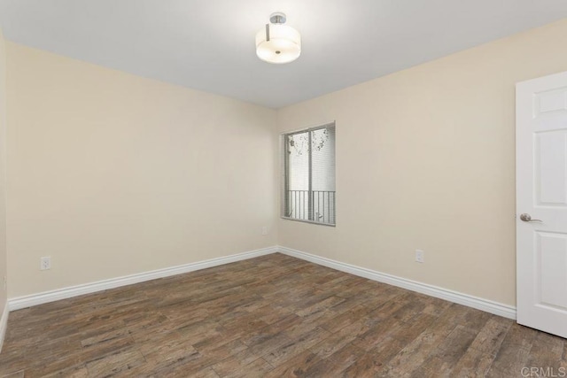 1811 E Grand Ave Unit 162, Escondido, CA 92027 - empty room with wood finished floors and baseboards