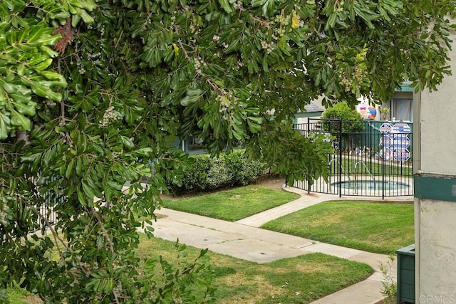 1811 E Grand Ave Unit 162, Escondido, CA 92027 - view of yard featuring a swimming pool