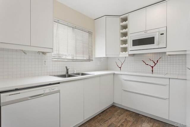1811 E Grand Ave Unit 162, Escondido, CA 92027 - kitchen featuring white appliances, white cabinetry, tasteful backsplash, and dark wood-type flooring