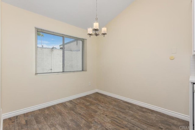 1811 E Grand Ave Unit 162, Escondido, CA 92027 - unfurnished room featuring a chandelier, dark wood finished floors, and vaulted ceiling