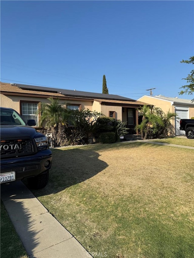 6045 Lincoln Ave, South Gate, CA 90280 - view of front of property featuring stucco siding and a front yard
