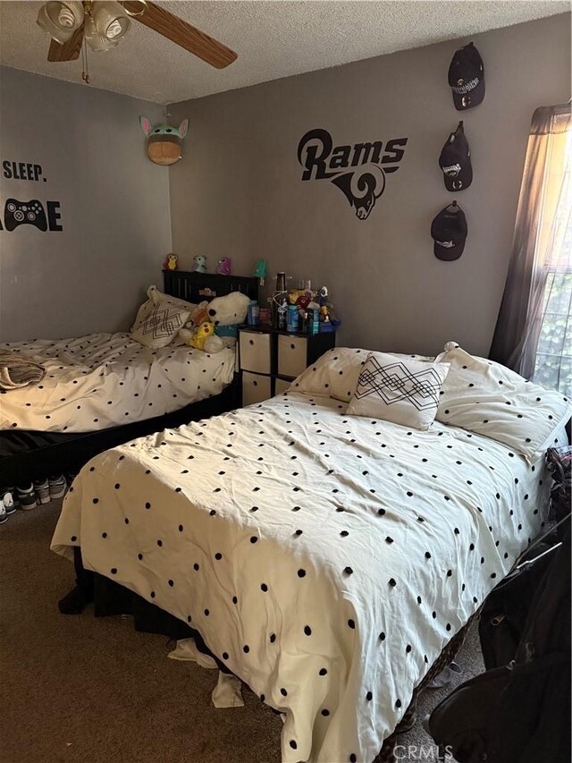 6045 Lincoln Ave, South Gate, CA 90280 - bedroom with carpet, a textured ceiling, and ceiling fan