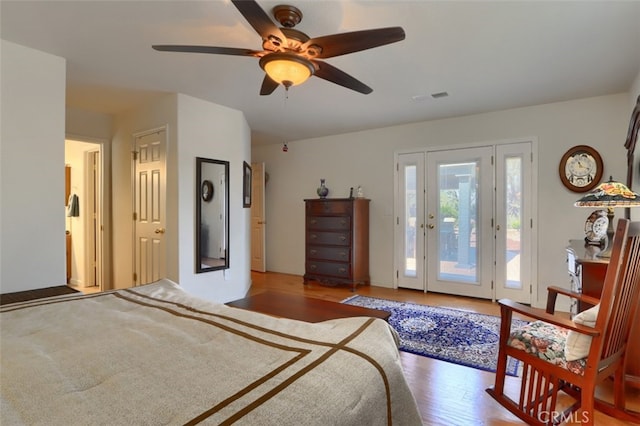 47003 Lookout Mountain Dr, Coarsegold, CA 93614 - bedroom featuring access to exterior, wood finished floors, and a ceiling fan