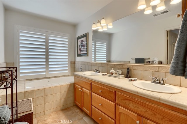 47003 Lookout Mountain Dr, Coarsegold, CA 93614 - full bathroom with double vanity, a bath, tile patterned flooring, and tasteful backsplash