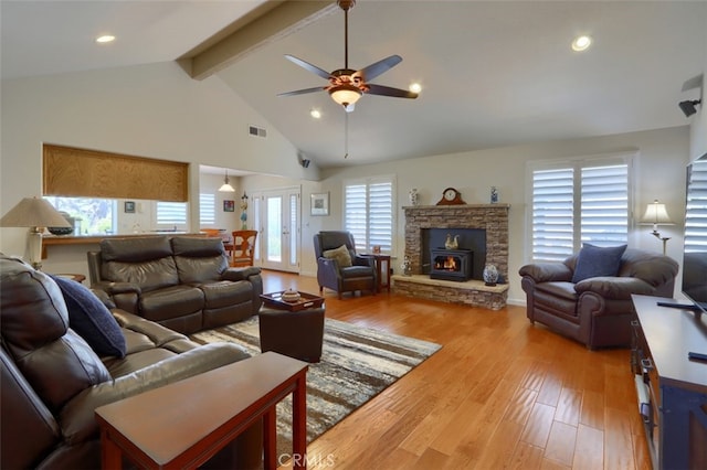 47003 Lookout Mountain Dr, Coarsegold, CA 93614 - living area featuring a ceiling fan, wood finished floors, a stone fireplace, and recessed lighting