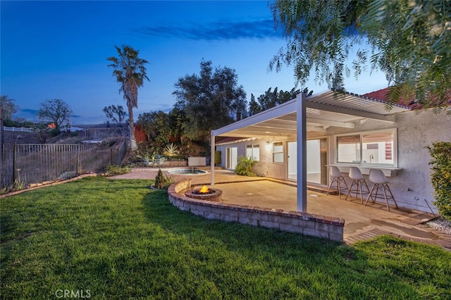 27403 Garza Dr, Saugus, CA 91350 - fenced backyard featuring a patio area, an outdoor fire pit, and a pergola