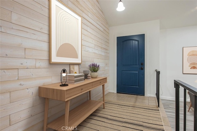 27403 Garza Dr, Saugus, CA 91350 - entrance foyer featuring wooden walls and vaulted ceiling