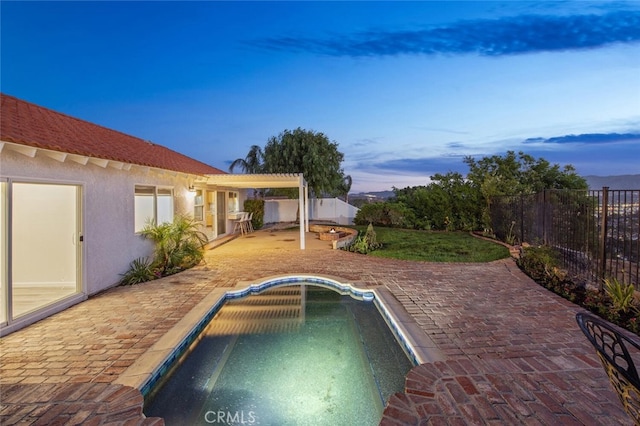 27403 Garza Dr, Saugus, CA 91350 - pool at dusk featuring a fenced backyard and a patio