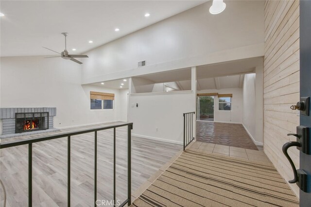 27403 Garza Dr, Saugus, CA 91350 - hallway featuring recessed lighting, wood finished floors, and high vaulted ceiling