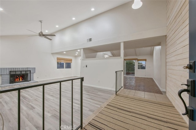 27403 Garza Dr, Saugus, CA 91350 - corridor with recessed lighting, wood finished floors, and high vaulted ceiling
