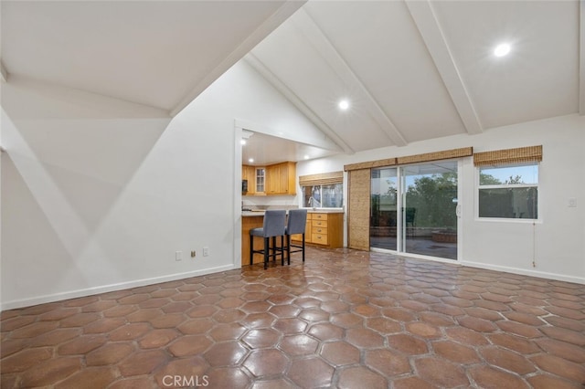 27403 Garza Dr, Saugus, CA 91350 - living room featuring beam ceiling, recessed lighting, and high vaulted ceiling