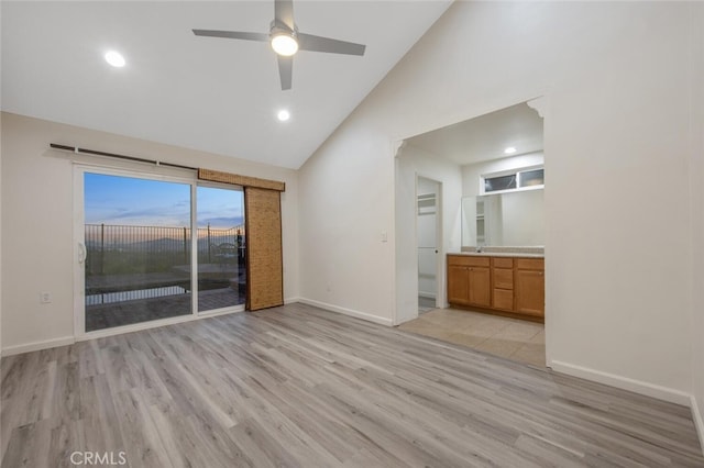 27403 Garza Dr, Saugus, CA 91350 - unfurnished living room featuring high vaulted ceiling, light wood finished floors, ceiling fan, and recessed lighting