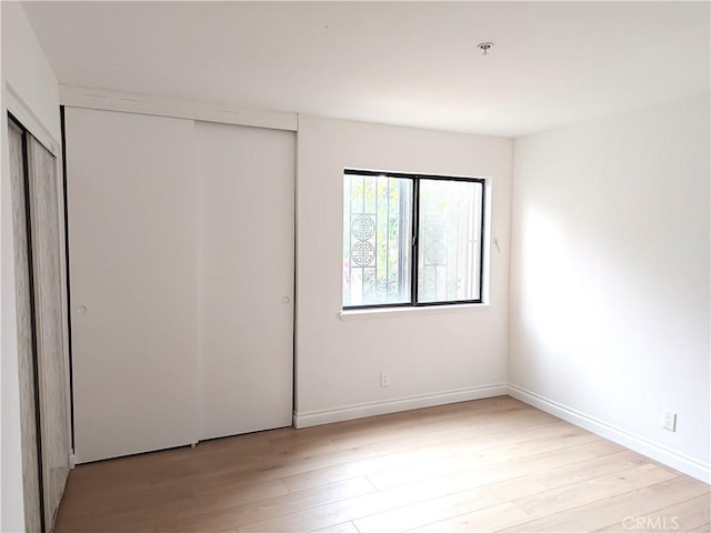 321 N Orange Ave Unit 103, Monterey Park, CA 91755 - unfurnished bedroom featuring light wood-style floors and a closet