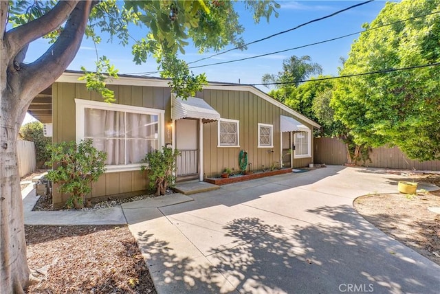263 S 3rd Ave, Upland, CA 91786 - view of front of property featuring board and batten siding and a patio area