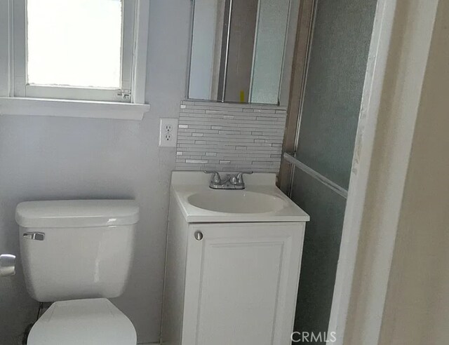 263 S 3rd Ave, Upland, CA 91786 - bathroom with vanity and decorative backsplash