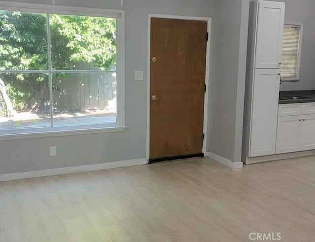263 S 3rd Ave, Upland, CA 91786 - entryway featuring light wood finished floors and plenty of natural light