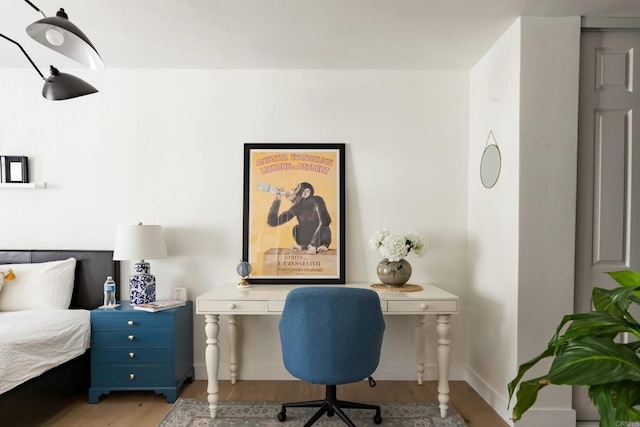 5645 Friars Rd Unit 370, San Diego, CA 92110 - bedroom with light wood-type flooring and baseboards