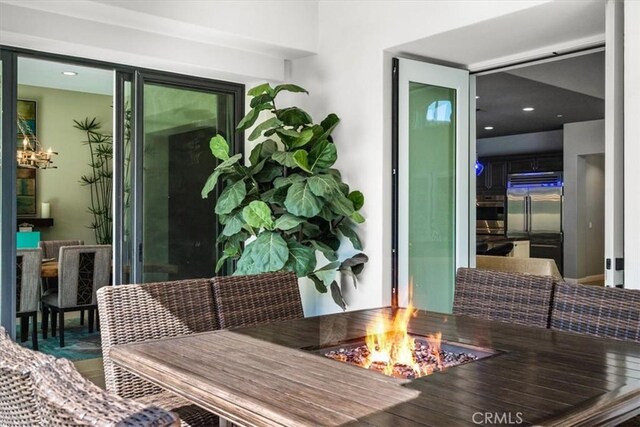 17 Emerald Ct, Rancho Mirage, CA 92270 - dining room with a chandelier and recessed lighting