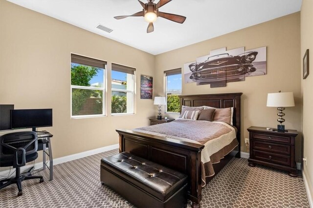 17 Emerald Ct, Rancho Mirage, CA 92270 - carpeted bedroom with an office area and ceiling fan