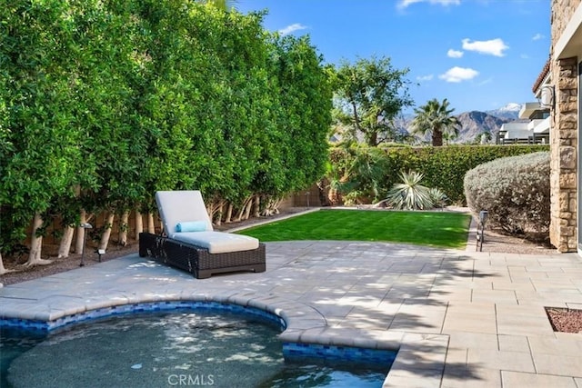 17 Emerald Ct, Rancho Mirage, CA 92270 - view of pool featuring a fenced backyard, a patio area, and a mountain view