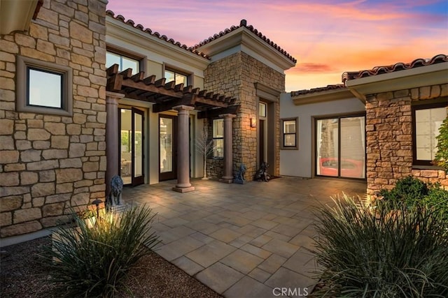 17 Emerald Ct, Rancho Mirage, CA 92270 - patio terrace at dusk featuring a patio and a pergola