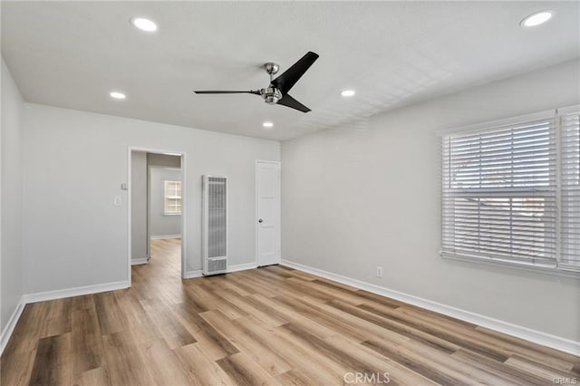 15702 Halldale Ave, Gardena, CA 90247 - unfurnished bedroom featuring a heating unit, recessed lighting, light wood-type flooring, and ceiling fan