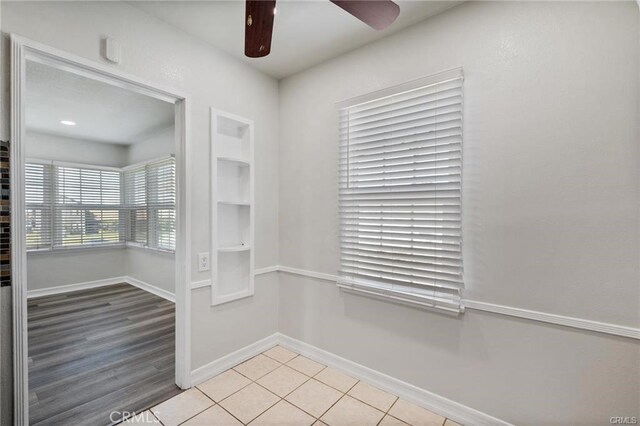 15702 Halldale Ave, Gardena, CA 90247 - empty room with a ceiling fan and light tile patterned floors
