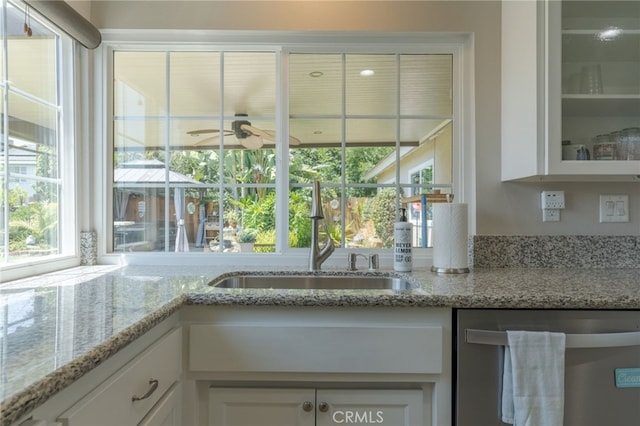 2247 Stratford Way, La Verne, CA 91750 - kitchen view of dishwasher, white cabinetry, glass insert cabinets, and ceiling fan