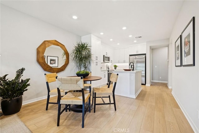15218 Janine Dr Unit 2, Whittier, CA 90605 - dining room featuring light wood finished floors and recessed lighting