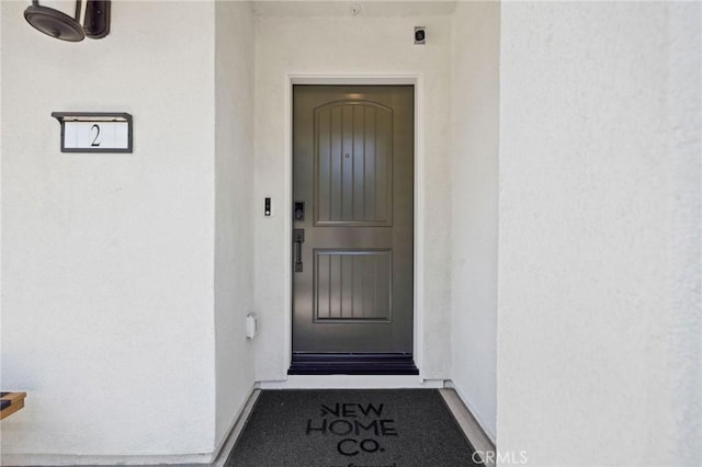15218 Janine Dr Unit 2, Whittier, CA 90605 - doorway to property featuring stucco siding
