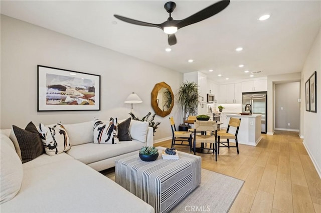 15218 Janine Dr Unit 2, Whittier, CA 90605 - living room with ceiling fan, light wood-style floors, and recessed lighting