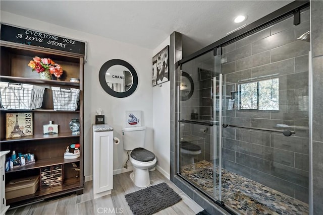 30451 San Pasqual Rd, Temecula, CA 92591 - bathroom featuring a shower stall, recessed lighting, and wood finished floors