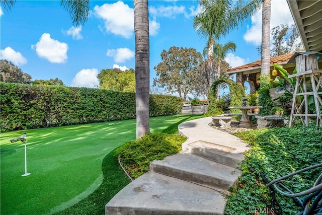 30451 San Pasqual Rd, Temecula, CA 92591 - fenced backyard with a putting area