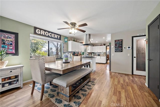 30451 San Pasqual Rd, Temecula, CA 92591 - dining area featuring a ceiling fan, light wood-style flooring, and recessed lighting