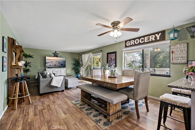30451 San Pasqual Rd, Temecula, CA 92591 - dining space featuring ceiling fan and wood finished floors