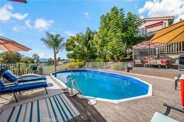 30451 San Pasqual Rd, Temecula, CA 92591 - view of swimming pool with a deck