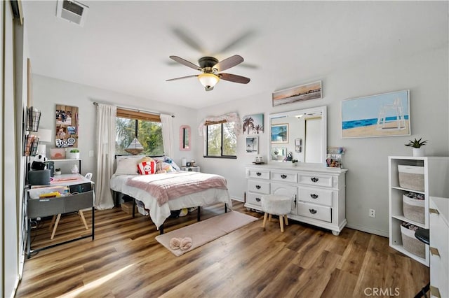 30451 San Pasqual Rd, Temecula, CA 92591 - bedroom featuring wood finished floors and a ceiling fan