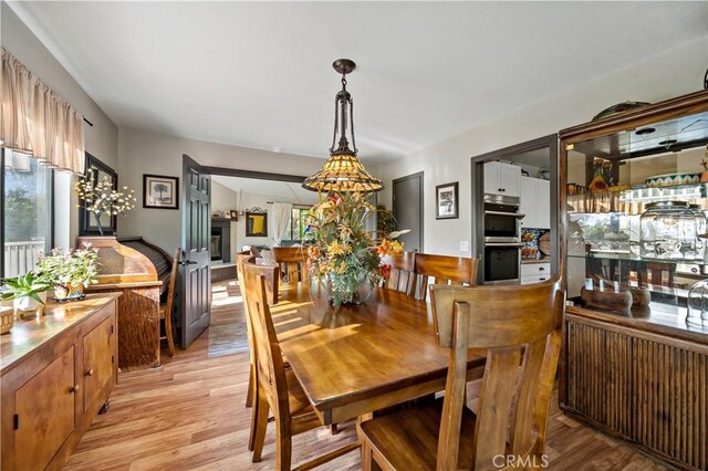 30451 San Pasqual Rd, Temecula, CA 92591 - dining room featuring light wood-type flooring