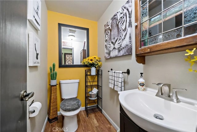 30451 San Pasqual Rd, Temecula, CA 92591 - half bath featuring wood finished floors and vanity