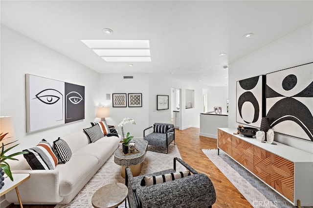 970 Quivera St, Laguna Beach, CA 92651 - living room with a skylight, recessed lighting, and light wood-type flooring