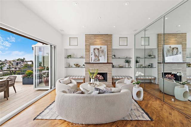 970 Quivera St, Laguna Beach, CA 92651 - living area featuring a tile fireplace, wood finished floors, and recessed lighting
