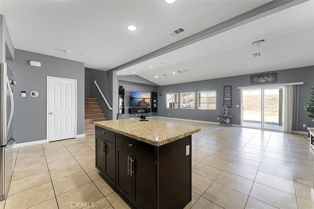26833 Calico Ct, Winchester, CA 92596 - kitchen with open floor plan, lofted ceiling, light tile patterned floors, a kitchen island, and recessed lighting