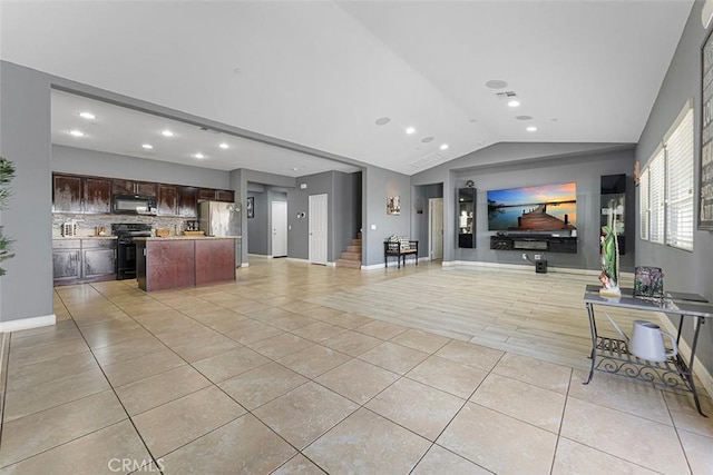 26833 Calico Ct, Winchester, CA 92596 - living room featuring light tile patterned floors, lofted ceiling, and recessed lighting