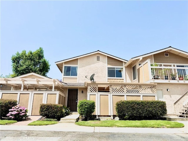 16944 Colchester Way Unit 174, Hacienda Heights, CA 91745 - view of front facade featuring stucco siding
