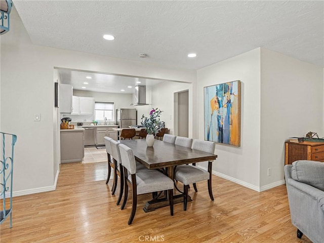 1234 N Pass Ave, Burbank, CA 91505 - dining space featuring light wood-style flooring, a textured ceiling, and recessed lighting