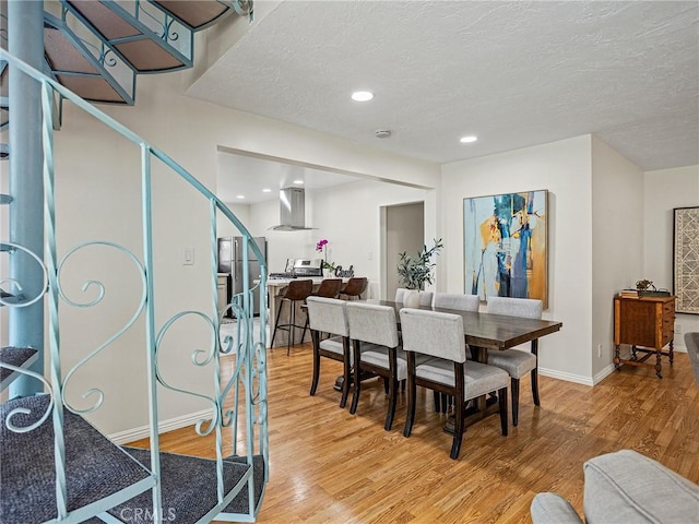 1234 N Pass Ave, Burbank, CA 91505 - dining room with light wood finished floors, stairway, a textured ceiling, and recessed lighting