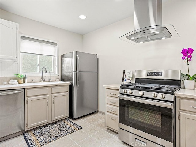 1234 N Pass Ave, Burbank, CA 91505 - kitchen featuring appliances with stainless steel finishes, island exhaust hood, light countertops, and light tile patterned floors